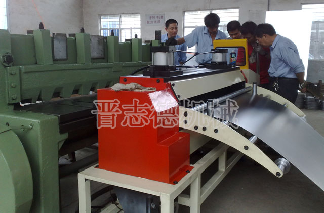 NC送料機配剪板機調(diào)試中